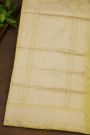 Banarasi Silk Pale Yellow Saree With Cross Lines Florals And Jaal Border