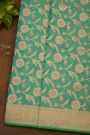 Banarasi Silk Sea Green Saree With Florals And Leaves Border