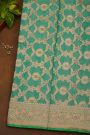 Banarasi Silk Sea Green Saree With Floral And Leaves Jaal Border