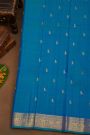 Kancheepuram Pure Silk Sky Blue Saree With Florals And Leaves With Peacocks Border