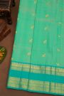 Kancheepuram Pure Silk Sea Green Saree With Florals And Leaves Traditional Gap Border
