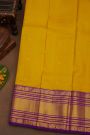 Kancheepuram Silk Yellow Saree With Cross Lines, Florals And Animals Border