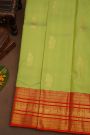 Kancheepuram Pure Silk Parrot Green Saree With Florals And Peacocks Traditional Border
