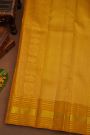 Kancheepuram Pure Silk Mustard Saree With Horizontal Zari Lines And Peacocks Border