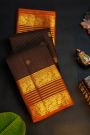 Kancheepuram Silk Brown Saree With Florals And Peacocks With Zari Lines Border