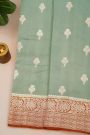 Fancy Matka Silk Sage Green Saree With Florals And Buttis Body And Contrast Florals And Leaves Jaal Border