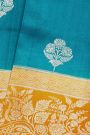 Fancy Matka Silk Peacock Blue Saree With Florals And Buttis Body And Contrast Florals And Leaves Jaal Border
