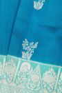 Fancy Matka Silk Peacock Blue Saree With Florals And Buttis Body And Contrast Florals And Leaves Border