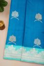 Fancy Matka Silk Royal Blue Saree With Florals And Buttis Body And Contrast Florals And Leaves Border