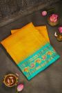 Gadwal Silk Yellow Saree With Checks Body And Contrast Tanjore Hand Printed Border