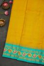 Gadwal Silk Yellow Saree With Checks Body And Contrast Tanjore Hand Printed Border