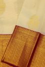 Kancheepuram Silk Cream Saree With Animal Buttis Body And Contrast Florals And Leaves With Animals Border