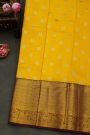 Kancheepuram Silk Yellow Saree With Peacock Buttis Body And Contrast Zari Diamonds, Florals And Animals Border