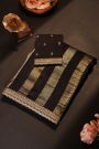 Fancy Kora Black Saree With Florals In Lines Body And Self Design Florals And Leaves In Zardozi Work Border