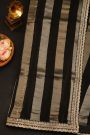 Fancy Kora Black Saree With Florals In Lines Body And Self Design Florals And Leaves In Zardozi Work Border