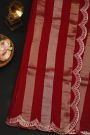 Fancy Kora Maroon Saree With All Over Lines Body And Self Design Florals And Leaves In Zardozi Work Border