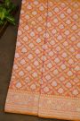 Pure Banarasi Silk Orange Saree WIth All Over Floral Jaal In Meenakari Weave Body
