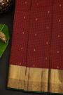 Kancheepuram Silk Maroon Saree With Florals And Leaves In Zari Checks Body And Traditional Kaddi Border
