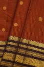 Kancheepuram Silk Rust Saree With Florals In Zari Lines Body And Contrast Traditional Border