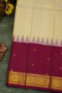 Kancheepuram Silk Cream Saree With Contrast Florals And Buttis Border