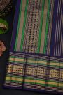 Kancheepuram Silk Parrot Green Saree With Buttis And Zari Lines Body