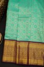 Kancheepuram Silk Sea Green Saree With Florals And Leaves Jaal Border