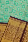 Kancheepuram Silk Sea Green Saree With Florals And Leaves Jaal Border