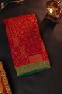 Fancy Georgette Red Saree With Florals And Leaves With Birds Body And Contrast Kaddi Border