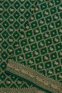 Fancy Georgette Bottle Green Saree With Diamond Grid Zari Jaal And Elephant Buttis Body And Self Florals And Animals Border