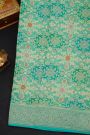 Fancy Georgette Sea Green Saree With All Over Florals In Meenakari Design Body