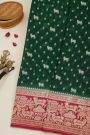 Banarasi Kaddi Georgette Bottle Green Saree With Florals And Pichwai Cows Body