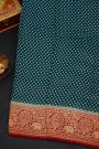 Banarasi Silk Teal Blue Saree With Zari Buttas Body And Contrast Florals And Leaves With Animals Border