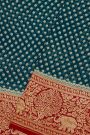 Banarasi Silk Teal Blue Saree With Zari Buttas Body And Contrast Florals And Leaves With Animals Border