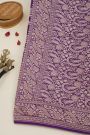 Banarasi Kaddi Georgette Purple Saree With Florals And Peacocks In Zari Body
