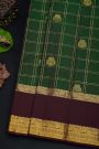 Kancheepuram Silk Bottle Green Saree With Florals And Peacocks In Zari Checks