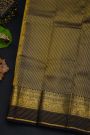 Kancheepuram Silk Yellow Saree With Florals And Leaves In Zari Body Contrast Border