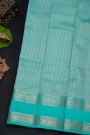 Kancheepuram Silk Navy Blue Saree With Florals And Pastel Colour Border