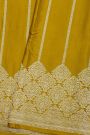 Banarasi Silk Mustard Saree With Zari Lines Body And Self Florals And Leaves Border