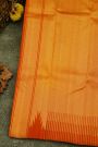 Kancheepuram Silk Rust Saree With Floral Buttis Body And Self Temple Border And Kaddi Pallu