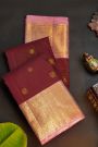Kancheepuram Silk Maroon Saree With Florals And Peacocks In Checks Body And Contrast Florals And Peacocks Border