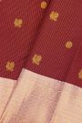 Kancheepuram Silk Maroon Saree With Florals And Peacocks In Checks Body And Contrast Florals And Peacocks Border