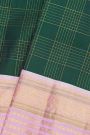 Kancheepuram Silk Bottle Green Saree With Zari Checks Body And Contrast Florals And Peacocks Border