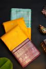 Kancheepuram Silk Yellow Saree With Dollar Buttis Body And Contrast Ganga Jamuna Border