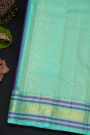 Kancheepuram Silk Dual Colour Saree With Peacock Buttis Body And Contrast Florals And Peacocks Border