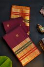 Kancheepuram Silk Wine Saree With Florals And Peacocks Body And Contrast Florals And Peacocks Border