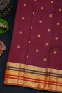 Kancheepuram Silk Wine Saree With Florals And Peacocks Body And Contrast Florals And Peacocks Border