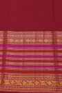 Kancheepuram Silk Maroon Saree With Florals And Peacocks In Checks Body And Self Zig-Zag Lines And Florals Border