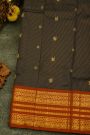 Kancheepuram Silk Black Saree With Gold Buttas And Rich Orange Traditional Zari Border