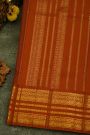 Kancheepuram Silk Black Saree With Gold Buttas And Rich Orange Traditional Zari Border