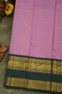 Kancheepuram Silk Lavender Saree With Gold Buttas And Peacock Motif Zari Border